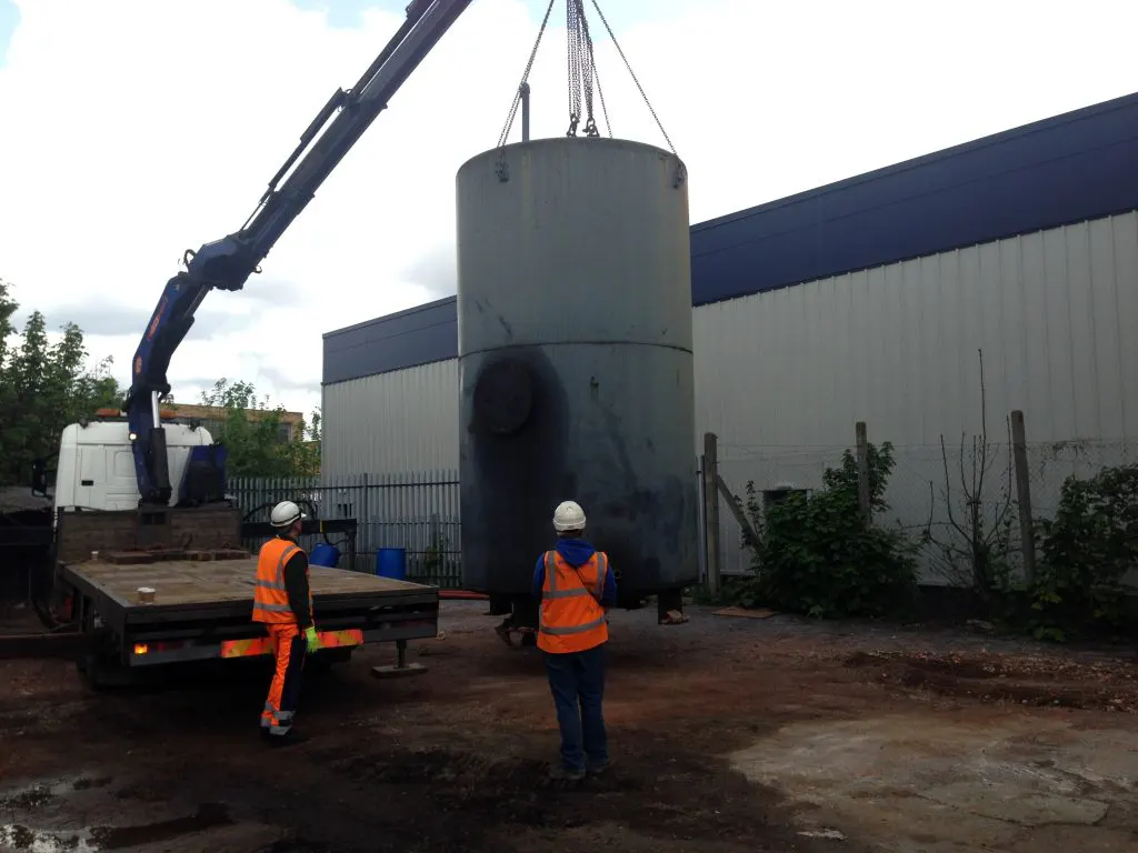 a tank being craned out